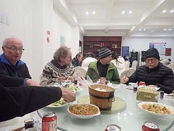 PB071297_1024px Dinner in the restaurant of the hotel. It was below freezing temps outside and no heating in the restaurant. The waiters had winter jacket and cap to keep warm.