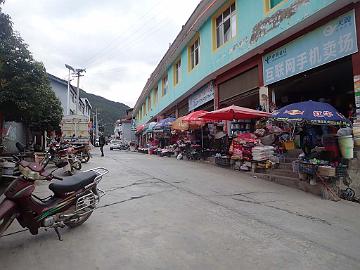 PB041053_1024px Side street with various stores and restaurants